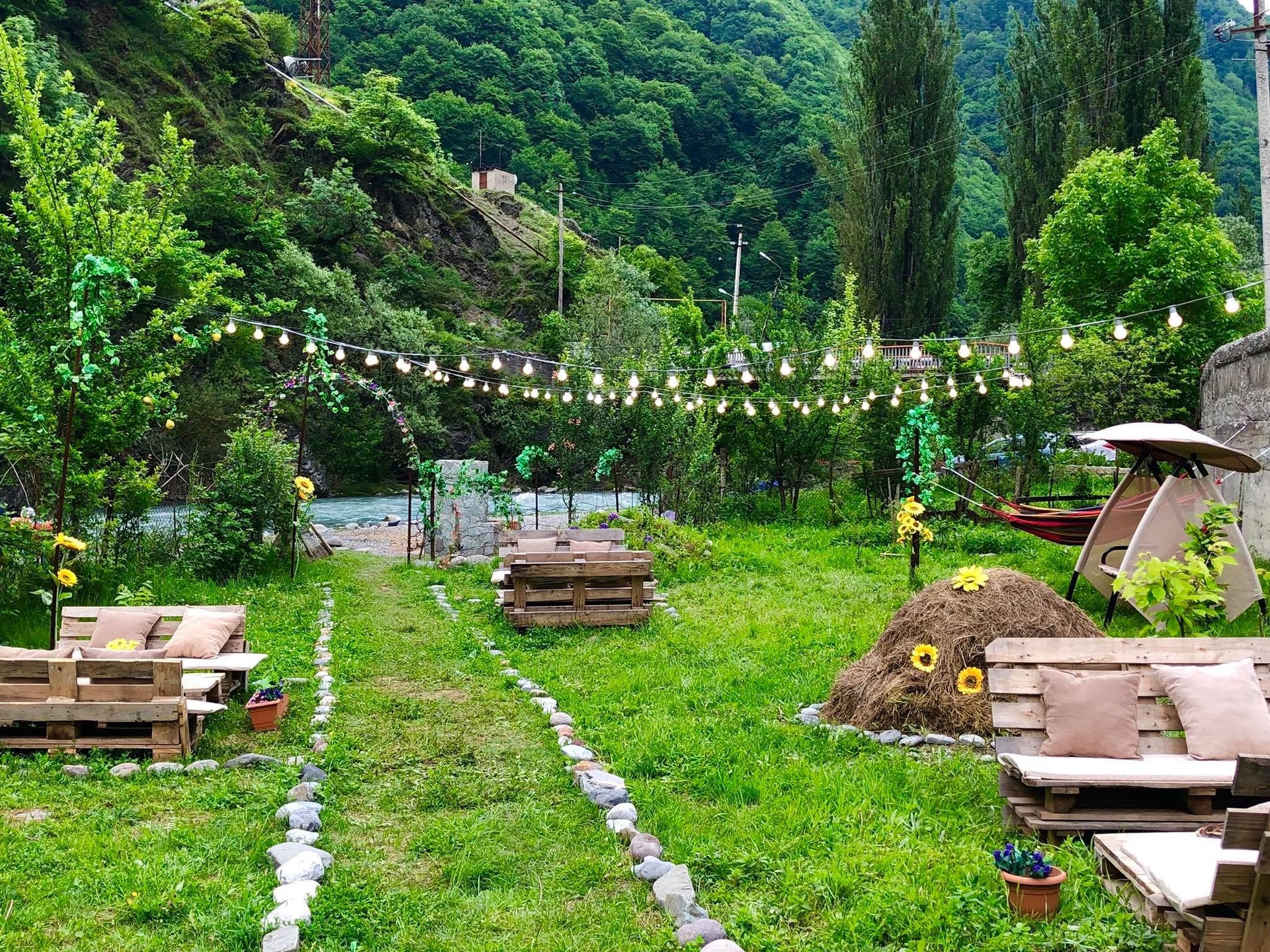 Riverside garden with fairy lights